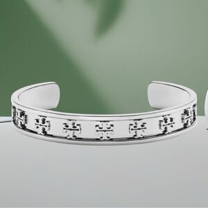 TORY BURCH RAISE LOGO SILVER OPEN CUFF BRACELET FITS MOST SIZES